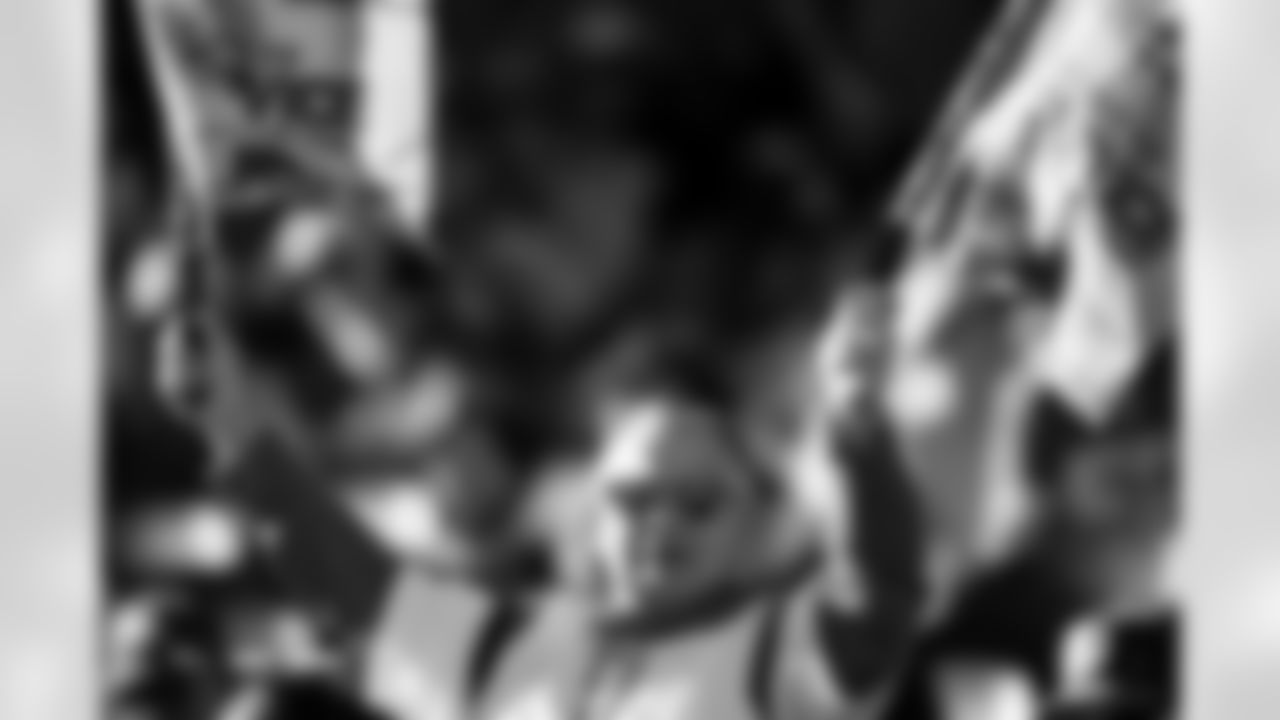 Fans wave Salute to Service flags before the Broncos' Week 11 game against the Kansas City Chiefs at Empower Field at Mile High in Denver, Colorado on November 16, 2025. Photo by Ben Swanson / Denver Broncos