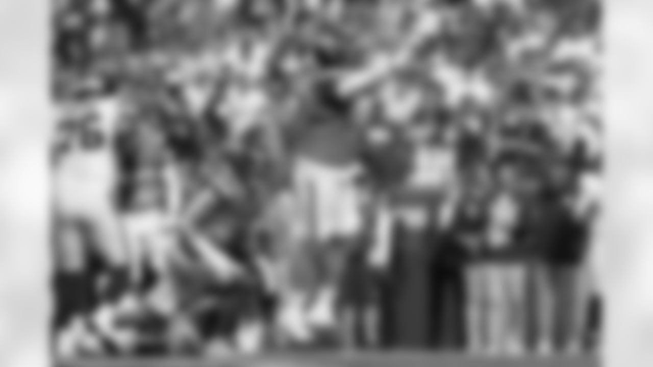 Denver Broncos defensive tackle Malcolm Roach (97) and linebacker Justin Strnad (40) react after making a tackle during the Broncos' Week 7 game against the New York Giants at Empower Field at Mile High in Denver, Colorado on October 19, 2025. Photo by Gabriel Christus / Denver Broncos