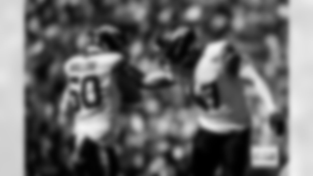 Denver Broncos linebacker Garret Wallow (50) and linebacker Karene Reid (47) celebrate after a play during the Broncos' Week 5 game against the Philadelphia Eagles at Lincoln Financial Field in Philadelphia, Pennsylvania on October 5, 2025. Photo by Gabriel Christus / Denver Broncos