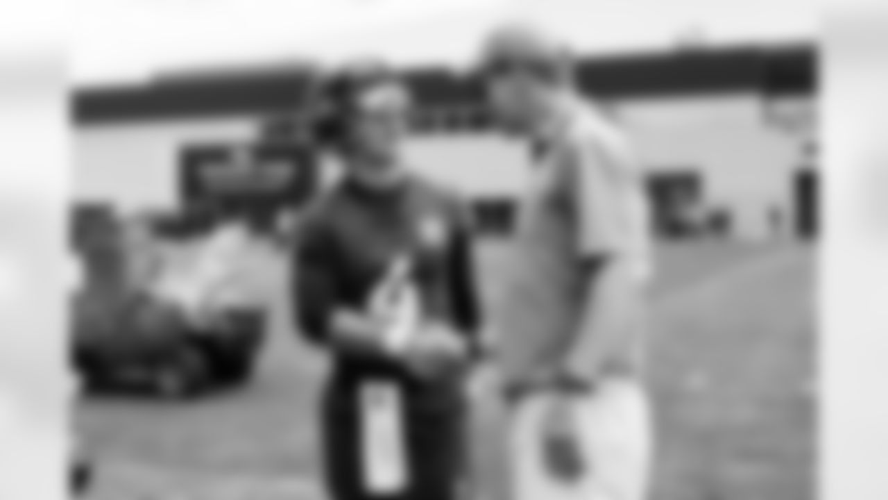 Sam Ehlinger and Peyton Manning during an OTA practice at Broncos Park Powered by CommonSpirit in Englewood, Colorado on June 5, 2025. Photo by Ben Swanson / Denver Broncos