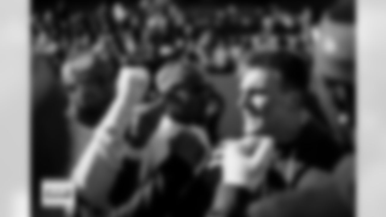 Bo Nix gives a pregame speech in a huddle before the Broncos' Divisional Round playoff game against the Buffalo Bills at Empower Field at Mile High in Denver, Colorado on January 17, 2026. Photo by Ben Swanson / Denver Broncos