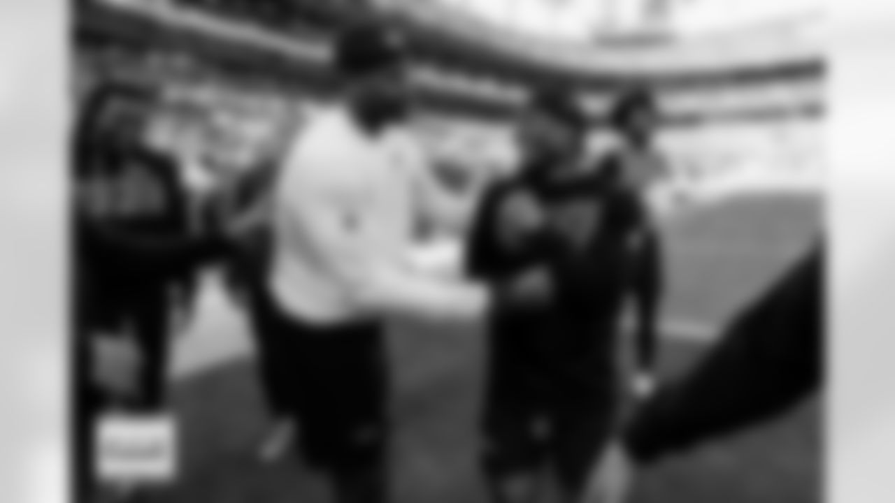 RJ Harvey shares a laugh with Courtland Sutton and teammates before the Broncos' Week 16 game against the Jacksonville Jaguars at Empower Field at Mile High in Denver, Colorado on December 21, 2025. Photo by Ben Swanson / Denver Broncos