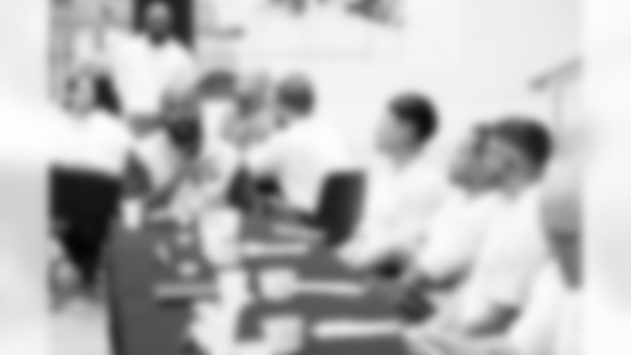 Jurrell Casey talks with inmates at lunch during a visit to the Arkansas Valley Correctional Facility in Ordway, Colorado on October 14, 2025. In partnership with the Vera Institute of Justice, the Denver Broncos Foundation toured ChangeMakers Village (a Restoring Promise Unit).Photo by Gabriel Christus / Denver Broncos