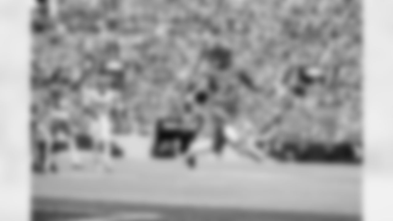 Denver Broncos running back J.K. Dobbins (27) holds the ball in the air as he scores a rushing touchdown during the Broncos' Week 1 game against the Tennessee Titans at Empower Field at Mile High in Denver, Colorado on September 7, 2025. Photo by Gabriel Christus / Denver Broncos