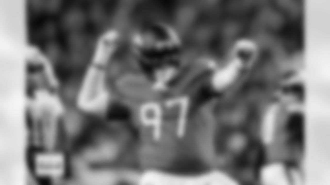 Denver Broncos defensive tackle Malcolm Roach (97) celebrates after a play during the Broncos' Week 15 game against the Green Bay Packers at Empower Field at Mile High in Denver, Colorado on December 14, 2025. Photo by Ben Swanson / Denver Broncos