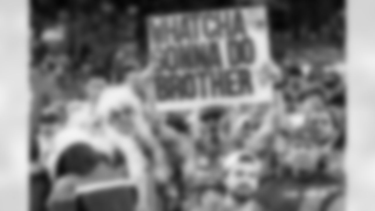 A Denver Broncos fan dressed as Hulk Hogan holds a sign during the Broncos' Week 18 game against the Los Angeles Chargers at Empower Field at Mile High in Denver, Colorado on January 4, 2026. Photo by Gavin Liddell / Denver Broncos