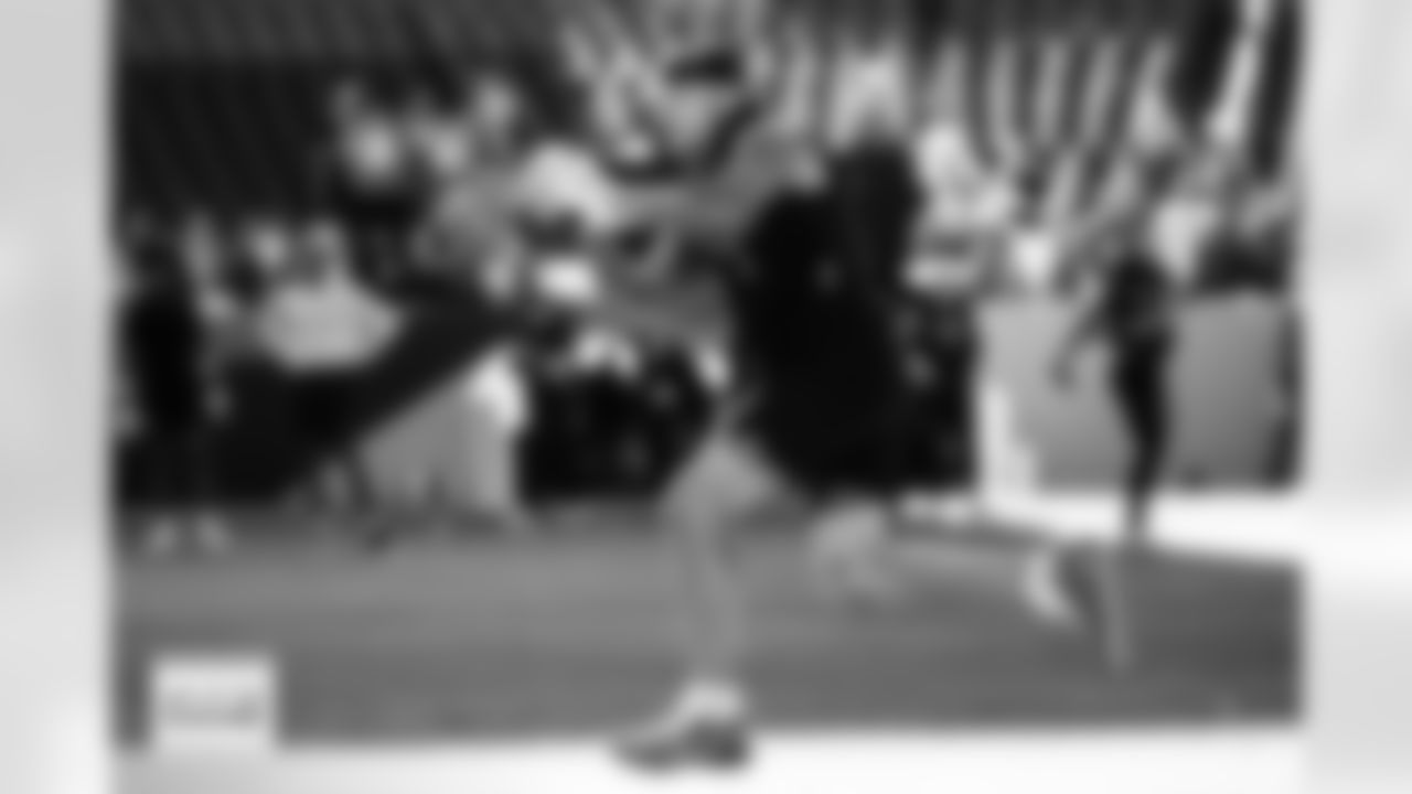 Evan Engram warms up before the Broncos' Week 15 game against the Green Bay Packers at Empower Field at Mile High in Denver, Colorado on December 14, 2025. Photo by Ben Swanson / Denver Broncos