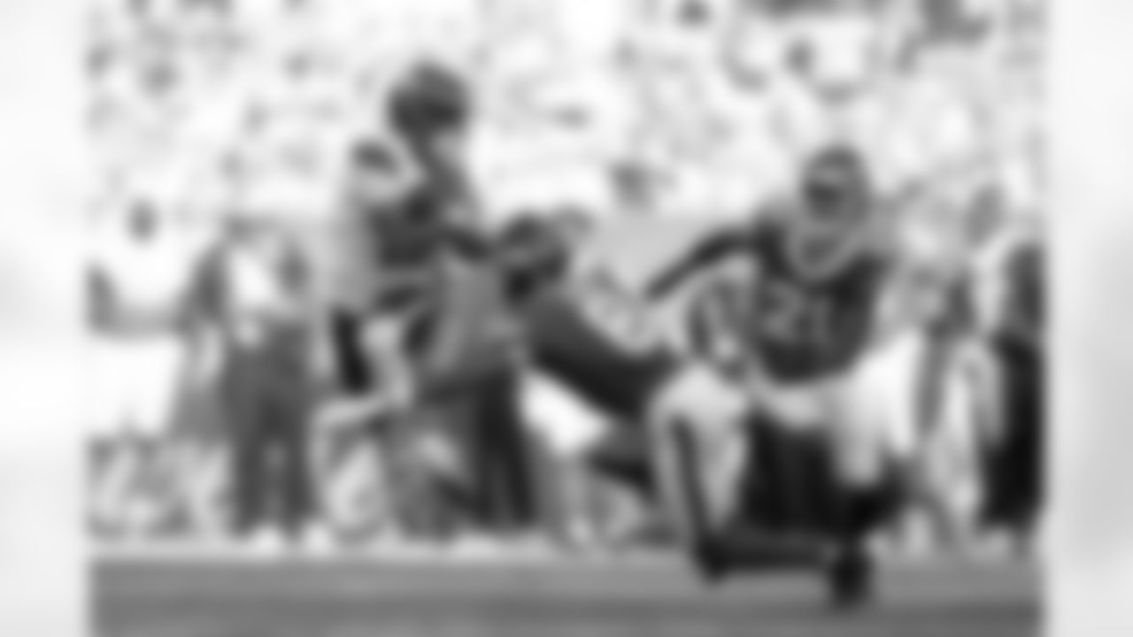 Denver Broncos wide receiver Pat Bryant (13) is tackled by New York Jets safety Andre Cisco (8) during the Broncos' Week 6 game against the New York Jets at Tottenham Hotspur Stadium in London, England on October 12, 2025. Photo by Gabriel Christus / Denver Broncos