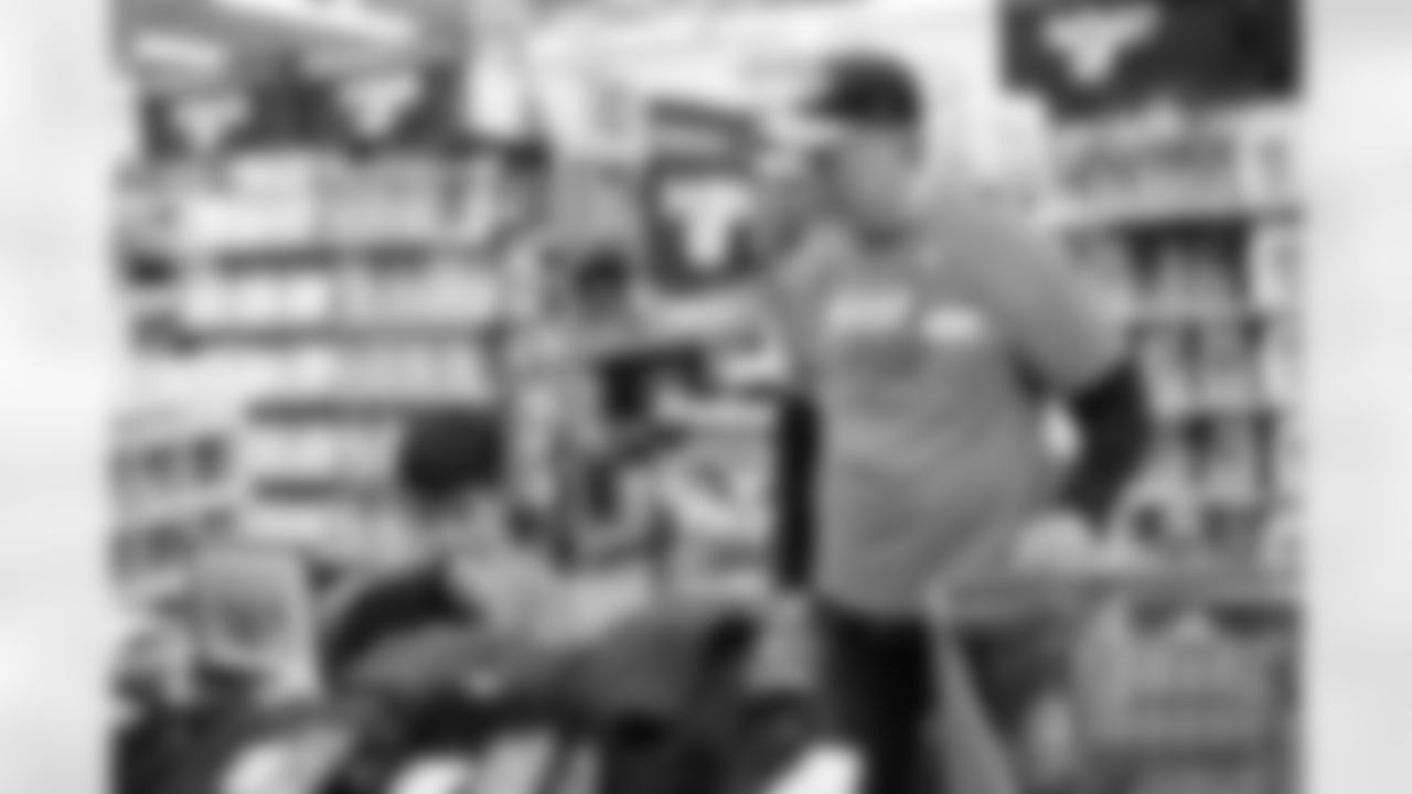 Children from the Denver Broncos Boys & Girls Club participate in a Shop with a Jock shopping spree with Broncos players, alumni and cheerleader alumni in Aurora, Colorado on December 2, 2025. Photo by Ben Swanson / Denver Broncos