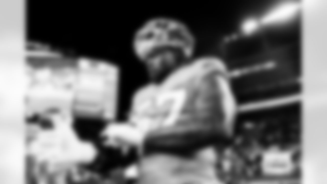 Denver Broncos linebacker Dre Greenlaw (57) adjusts his arm brace before the Broncos' Week 10 game against the Las Vegas Raiders at Empower Field at Mile High in Denver, Colorado on November 6, 2025. Photo by Gabriel Christus / Denver Broncos