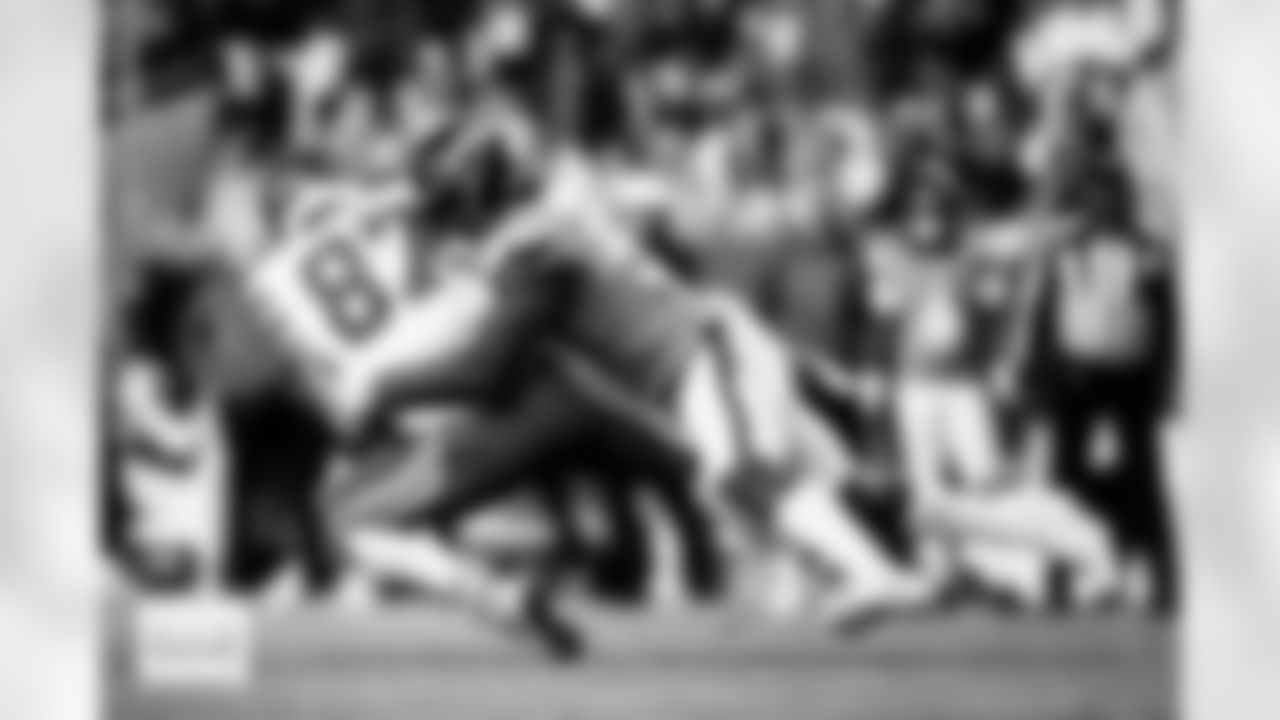 Denver Broncos linebacker Dre Greenlaw (57) tackles Kansas City Chiefs tight end Travis Kelce (87) during the Broncos' Week 11 game against the Kansas City Chiefs at Empower Field at Mile High in Denver, Colorado on November 16, 2025. Photo by Ben Swanson / Denver Broncos