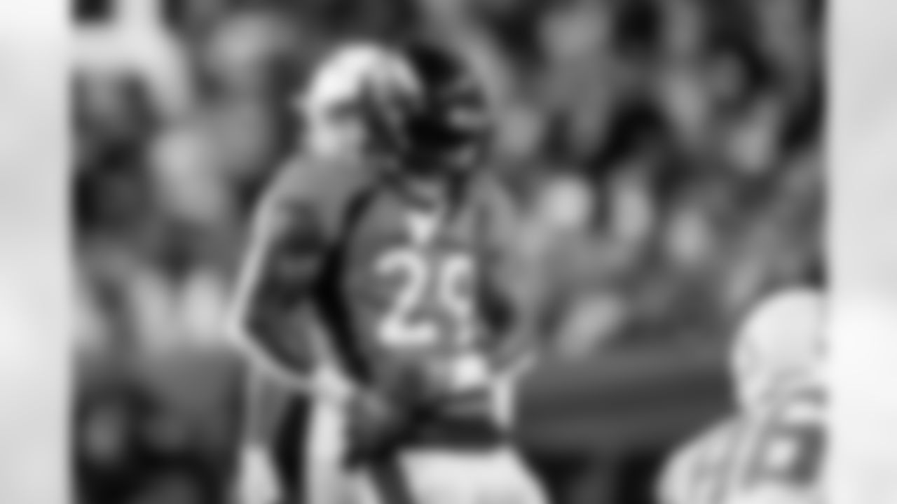 Denver Broncos cornerback Ja'Quan McMillian (29) celebrates after a pass breakup during the Broncos' Week 17 game against the Los Angeles Chargers at Empower Field at Mile High in Denver, Colorado on December 31, 2023. Photo by Ben Swanson / Denver Broncos