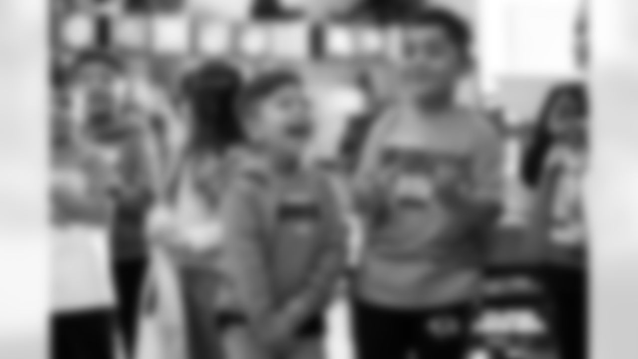 Students cheer on the Broncos during a school hallway parade to celebrate the Denver Broncos making the playoffs at Godsman Elementary School in Denver, Colorado on January 16, 2026. Photo by Ben Swanson / Denver Broncos