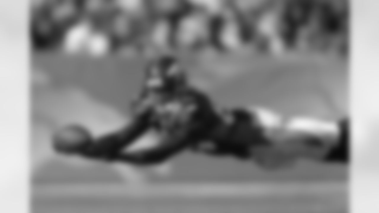 Denver Broncos wide receiver Brandon Lloyd (84) makes a diving attempt at a catch during a game against the Indianapolis Colts on Sunday, Sept. 26, 2010 in Denver. (AP Photo/Greg Trott)