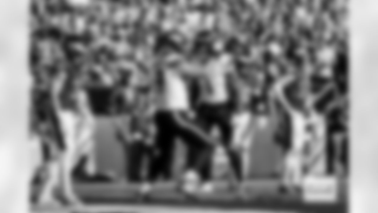 Denver Broncos tight end Evan Engram (1) celebrates with offensive tackle Mike McGlinchey (69) after a touchdown during the Broncos' Week 5 game against the Philadelphia Eagles at Lincoln Financial Field in Philadelphia, Pennsylvania on October 5, 2025. Photo by Ben Swanson / Denver Broncos