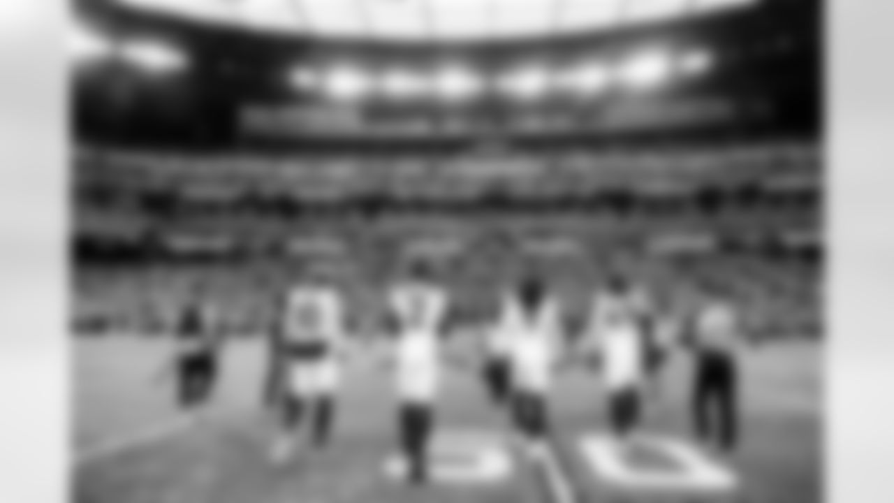 Denver Broncos quarterback Bo Nix (10), cornerback Pat Surtain II (2), safety Talanoa Hufanga (9) and linebacker Alex Singleton (49) walk out for the coin toss before the Broncos' Week 14 game against the Las Vegas Raiders at Allegiant Stadium in Las Vegas, Nevada on December 7, 2025. Photo by Gabriel Christus / Denver Broncos