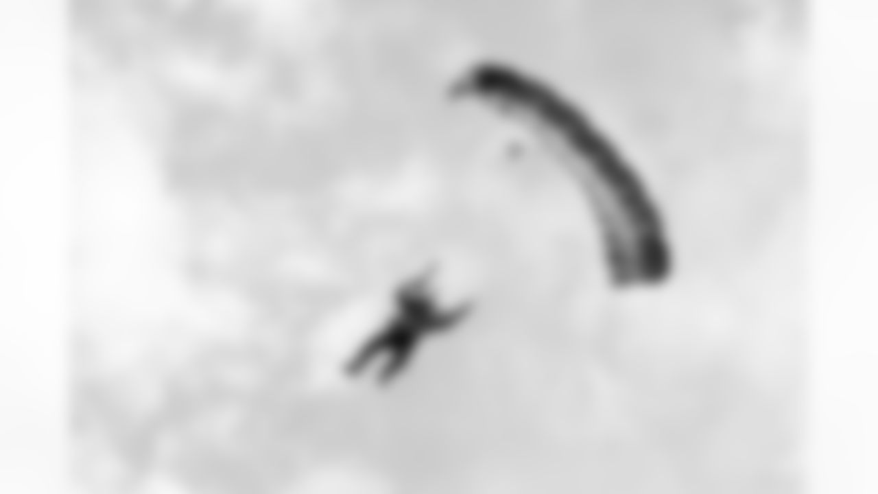 A Thunderstorm skydiver parachutes into the stadium before the Broncos' Week 4 game against the Cincinnati Bengals at Empower Field at Mile High in Denver, Colorado on September 29, 2025. Photo by Gavin Liddell / Denver Broncos