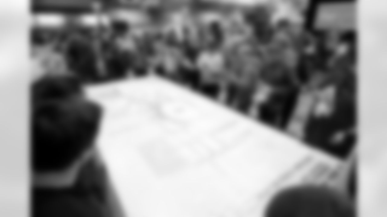 Community members check out the map of the proposed site of the new Denver Broncos Stadium during a community information meeting to inform and request input from the community on Thursday, February 12, 2026 at La Alma Recreation Center in Denver, Colorado.
Photo by Gabriel Christus / Denver Broncos