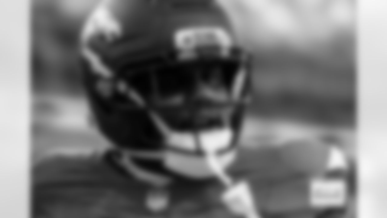 Denver Broncos defensive tackle Malcolm Roach (97) looks on before the Broncos' Divisional Round playoff game against the Buffalo Bills at Empower Field at Mile High in Denver, Colorado on January 17, 2026. Photo by Ben Swanson / Denver Broncos