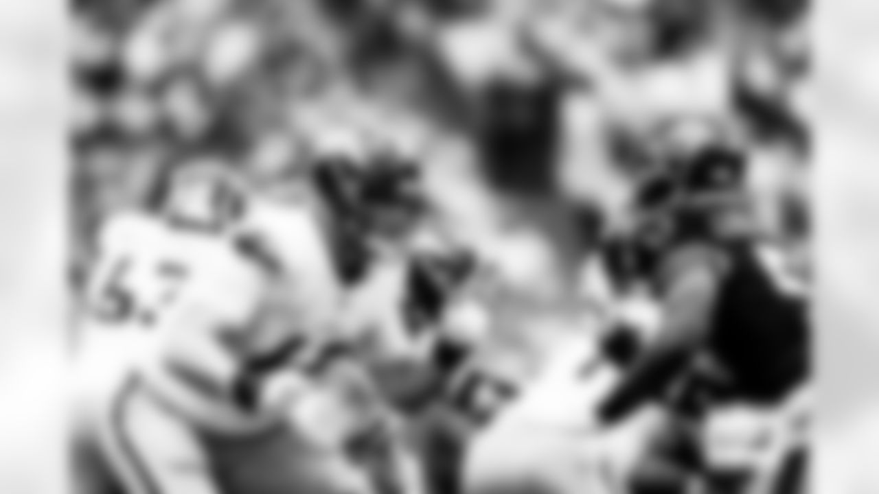 Denver Broncos offensive tackle Mike McGlinchey (69) blocks Houston Texans defensive end Will Anderson Jr. (51) during the Broncos' Week 9 game against the Houston Texans at NRG Stadium in Houston, Texas on November 2, 2025. Photo by Ben Swanson / Denver Broncos