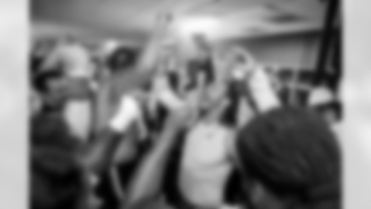 Alex Singleton breaks down the huddle with teammates in the locker room after the Broncos' Week 5 game against the Philadelphia Eagles at Lincoln Financial Field in Philadelphia, Pennsylvania on October 5, 2025. Photo by Gabriel Christus / Denver Broncos