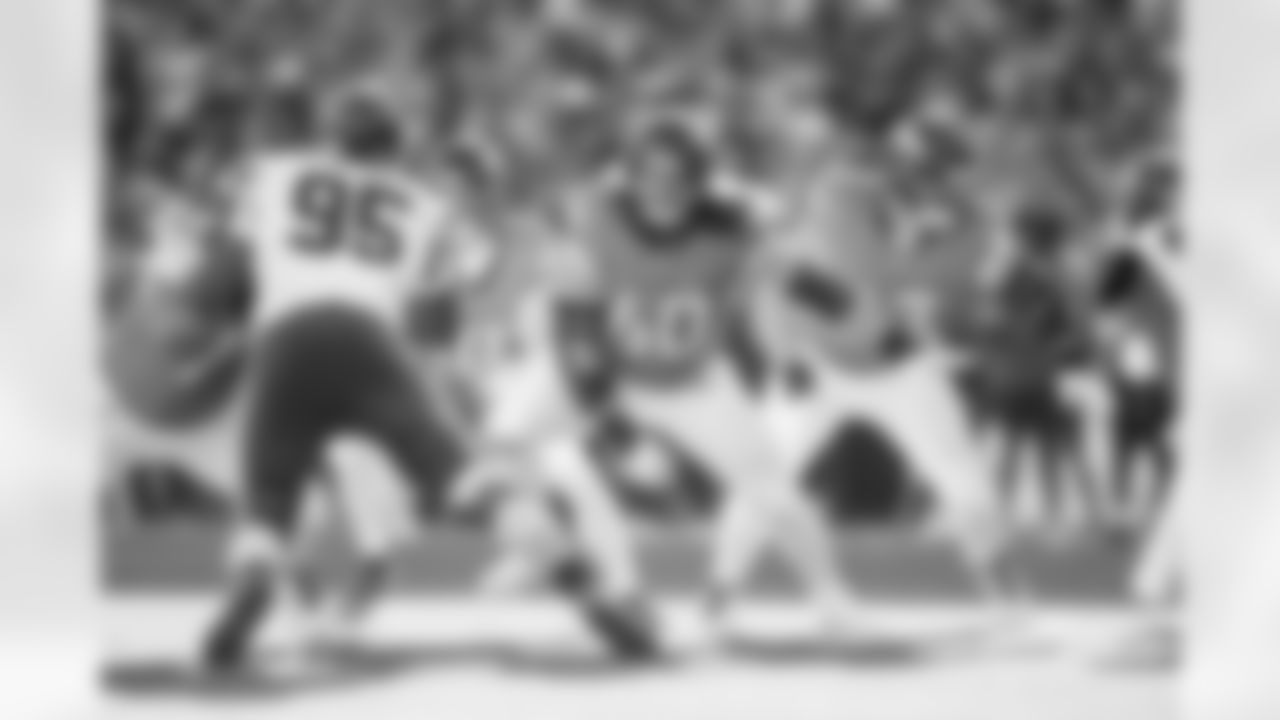 Denver Broncos center Luke Wattenberg (60) and offensive tackle Alex Palczewski (63) block during the Broncos' Week 11 game against the Kansas City Chiefs at Empower Field at Mile High in Denver, Colorado on November 16, 2025. Photo by Ben Swanson / Denver Broncos