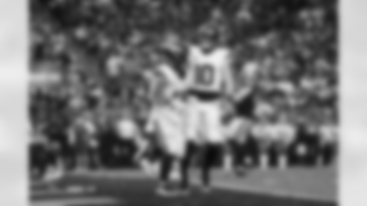 Bo Nix and RJ Harvey (12) during the Broncos' Week 14 game against the Las Vegas Raiders at Allegiant Stadium in Las Vegas, Nevada on December 7, 2025. Photo by Gabriel Christus / Denver Broncos