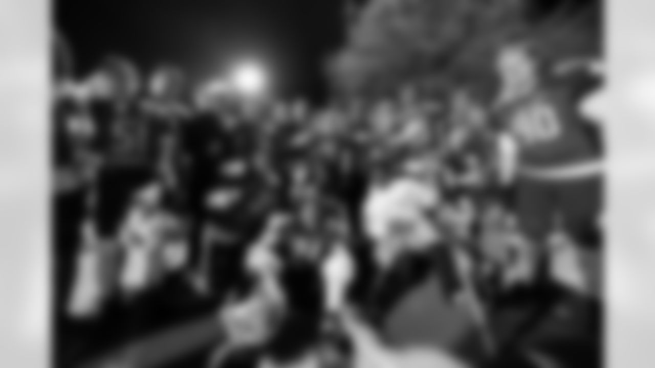 Pat Surtain II poses for a photo with Cherry Creek high School players during a visit to watch Cherry Creek play Fountain Fort Carson on Friday, November 14, 2025 at Cherry Creek High School in Greenwood Village, Colorado.
Photo by Gabriel Christus / Denver Broncos