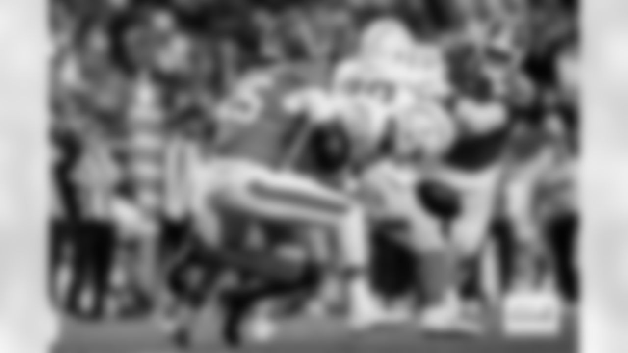 Nik Bonitto strip-sacks Trey Lance during the Broncos' Week 18 game against the Los Angeles Chargers at Empower Field at Mile High in Denver, Colorado on January 4, 2026. Photo by Ben Swanson / Denver Broncos