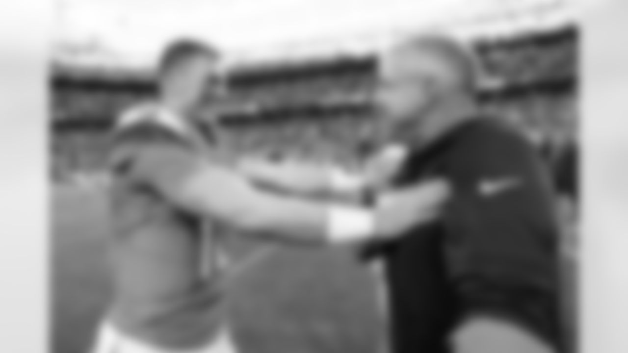 Denver Broncos head coach Sean Payton greets quarterback Bo Nix (10) after the Broncos' Week 7 game against the New York Giants at Empower Field at Mile High in Denver, Colorado on October 19, 2025. Photo by Ben Swanson / Denver Broncos