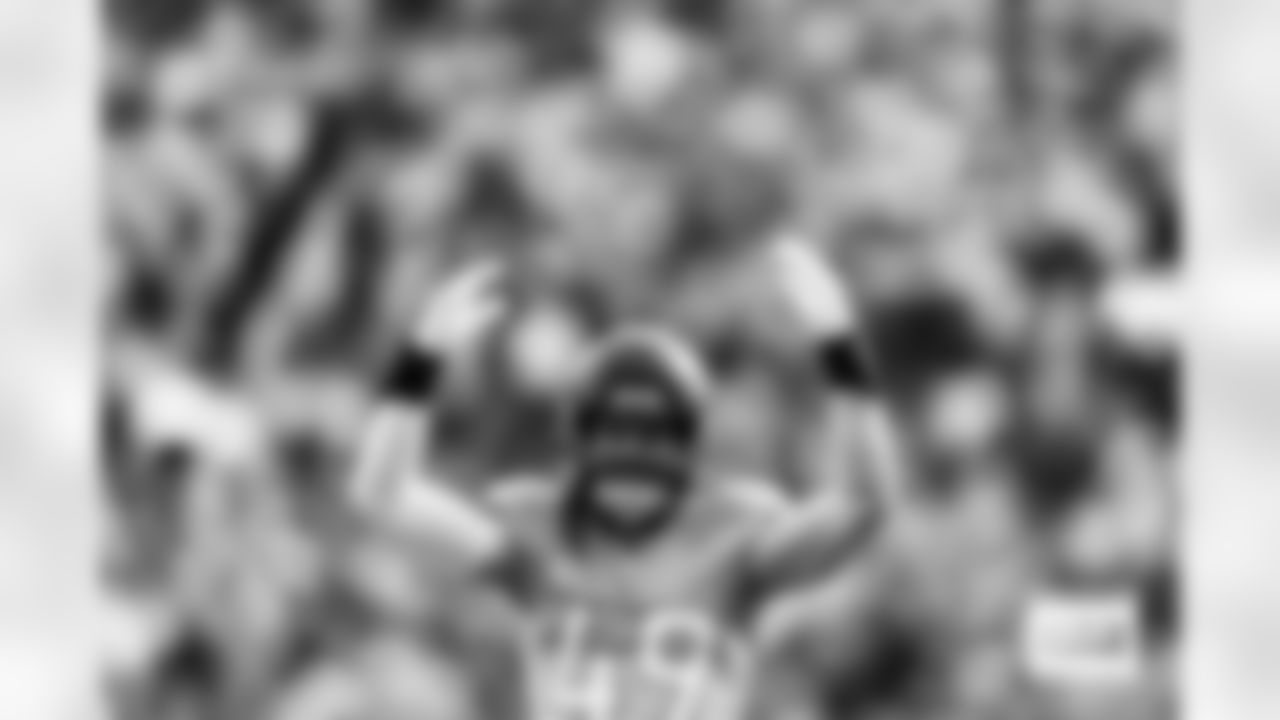 Denver Broncos linebacker Alex Singleton (49) raises his hands to get the crtowd hyped during the AFC Championship Game between the Denver Broncos and New England Patriots at Empower Field at Mile High in Denver, Colorado on January 25, 2026. Photo by Gabriel Christus / Denver Broncos