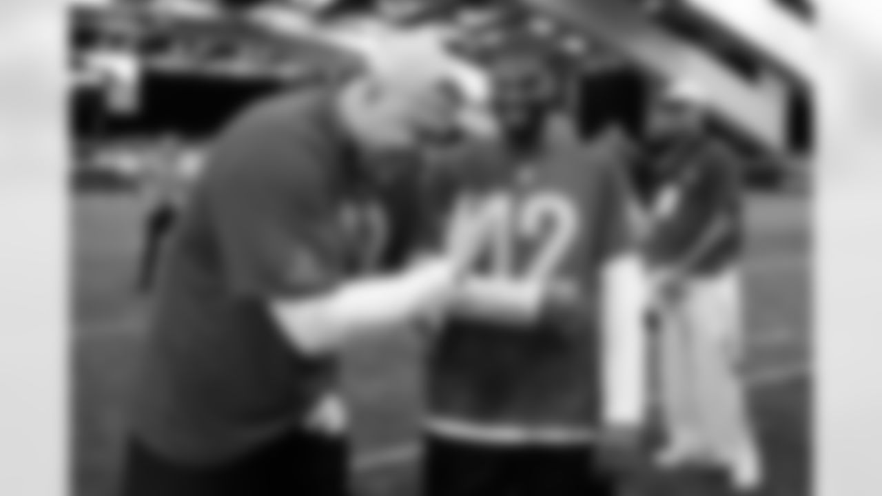 AFC offensive tackle Garett Bolles, of the Denver Broncos, left, laughs with quarterback Shedeur Sanders, of the Cleveland Browns, during NFL Pro Bowl Games practice in San Francisco, Sunday, Feb. 1, 2026. (AP Photo/Godofredo A. Vásquez)