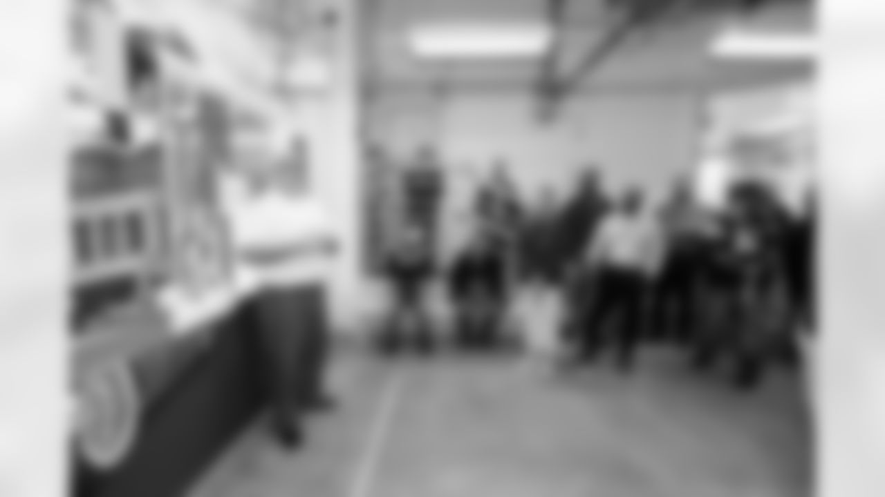 An inmate talks about his mural in the mental health ward during a visit to the Arkansas Valley Correctional Facility in Ordway, Colorado on October 14, 2025. In partnership with the Vera Institute of Justice, the Denver Broncos Foundation toured ChangeMakers Village (a Restoring Promise Unit).Photo by Gabriel Christus / Denver Broncos