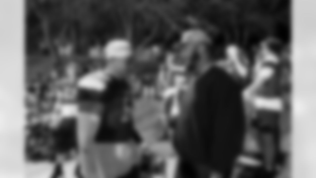 John Franklin-Myers talks with a Cherry Creek High School player during a visit to watch Cherry Creek play Fountain Fort Carson on Friday, November 14, 2025 at Cherry Creek High School in Greenwood Village, Colorado.
Photo by Gabriel Christus / Denver Broncos