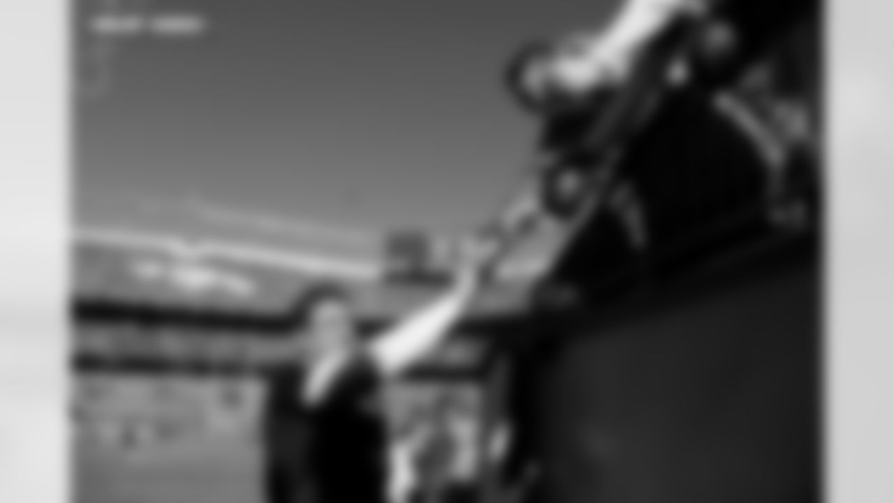 Denver Broncos defensive end Zach Allen signs autographs for fans before the Broncos' Divisional Round playoff game against the Buffalo Bills at Empower Field at Mile High in Denver, Colorado on January 17, 2026. Photo by Gabriel Christus / Denver Broncos