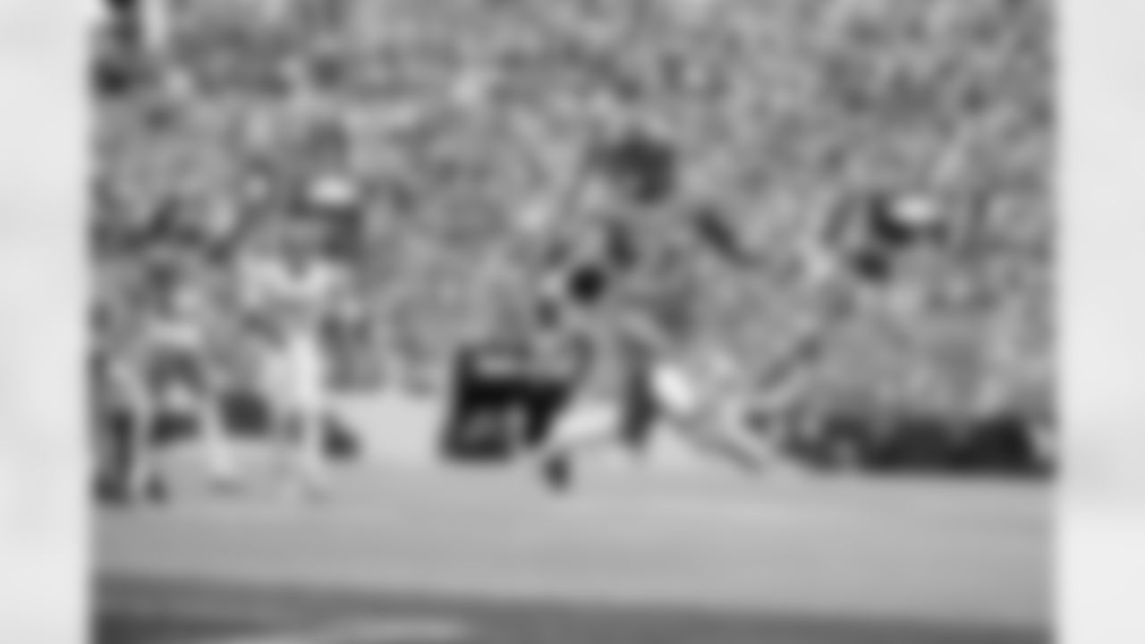 Denver Broncos running back J.K. Dobbins (27) holds the ball in the air as he scores a rushing touchdown during the Broncos' Week 1 game against the Tennessee Titans at Empower Field at Mile High in Denver, Colorado on September 7, 2025. Photo by Gabriel Christus / Denver Broncos