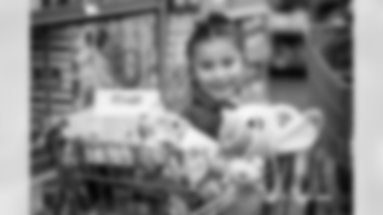 Children from the Boys & Girls Club participate in a Shop with a Jock shopping spree with Broncos players, alumni and cheerleader alumni in Aurora, Colorado on December 15, 2025. Photo by Ben Swanson / Denver Broncos