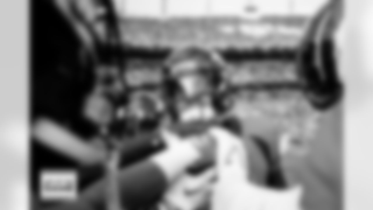 Denver Broncos safety Justin Simmons (31) gives a pregame speech in the defensive backs huddle before the Broncos' Week 17 game against the Los Angeles Chargers at Empower Field at Mile High in Denver, Colorado on December 31, 2023. Photo by Ben Swanson / Denver Broncos