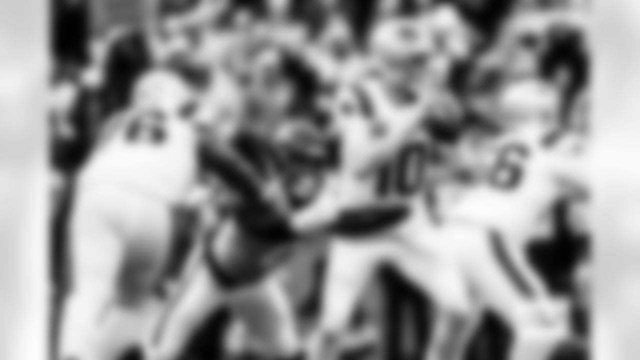 Denver Broncos linebacker Jonathon Cooper (0) pressures New England Patriots quarterback Drake Maye (10) during the AFC Championship Game between the Denver Broncos and New England Patriots at Empower Field at Mile High in Denver, Colorado on January 25, 2026. Photo by Ben Swanson / Denver Broncos