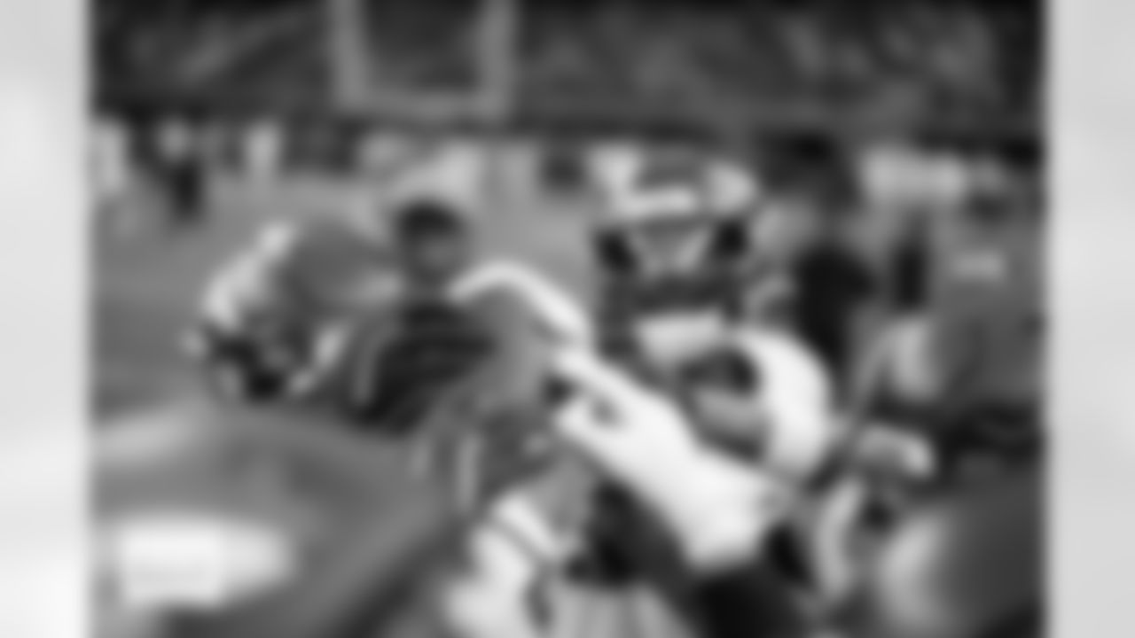 The Denver Broncos defensive backs hold a ball up in a huddle before the Broncos' Week 14 game against the Las Vegas Raiders at Allegiant Stadium in Las Vegas, Nevada on December 7, 2025. Photo by Gabriel Christus / Denver Broncos