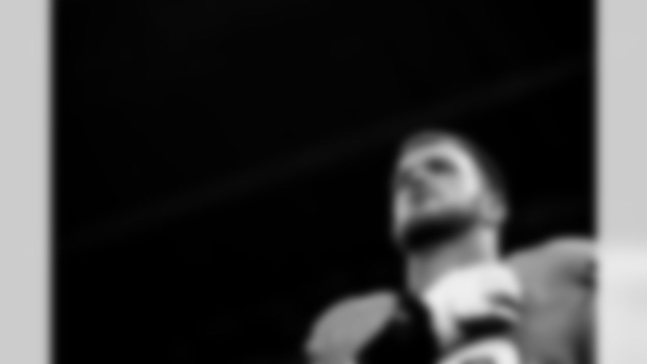 Denver Broncos offensive tackle Mike McGlinchey (69) stands for the national anthem before the Broncos' Week 2 game against the Indianapolis Colts at Lucas Oil Stadium in Indianapolis, Indiana on September 14, 2025. Photo by Gabriel Christus / Denver Broncos