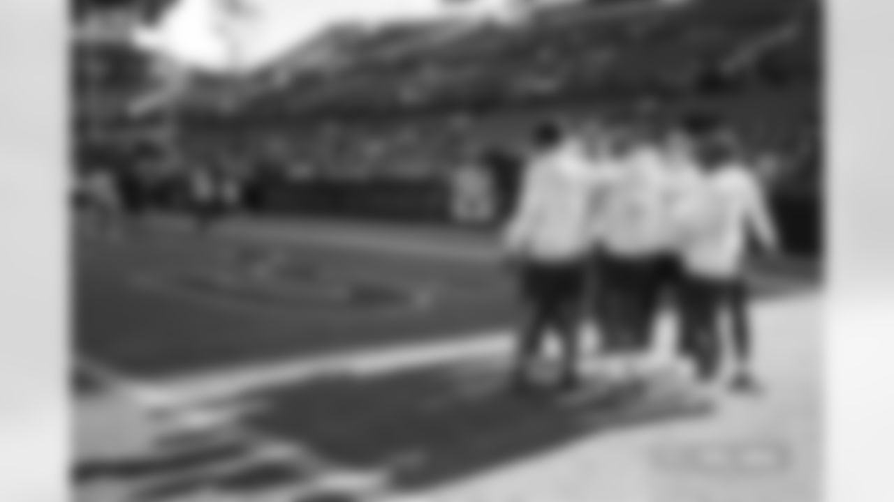 The wide receivers and quarterbacks huddle before the Broncos' Week 11 game against the Atlanta Falcons at Empower Field at Mile High in Denver, Colorado on November 17, 2024. Photo by Ben Swanson / Denver Broncos