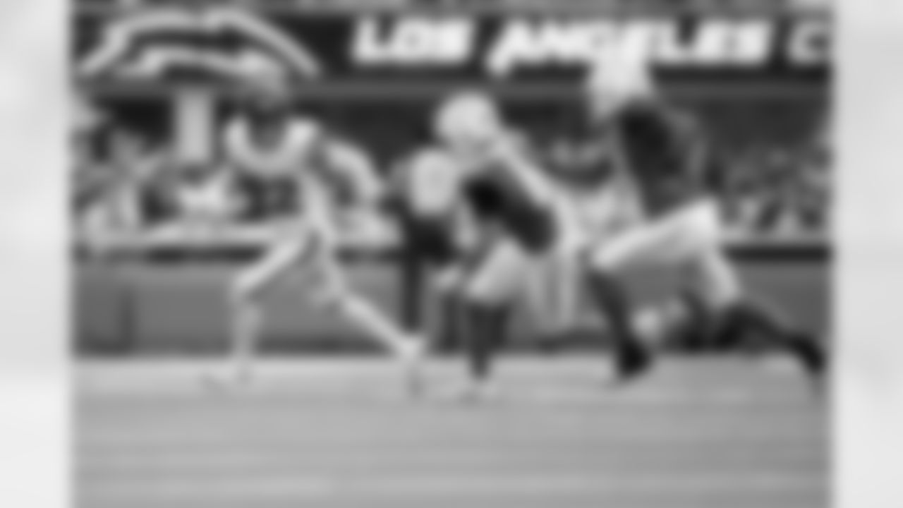 Denver Broncos safety Brandon Jones (22) runs with the ball after an interception during the Broncos' Week 3 game against the Los Angeles Chargers at SoFi Stadium in Inglewood, California on September 21, 2025. Photo by Gabriel Christus / Denver Broncos