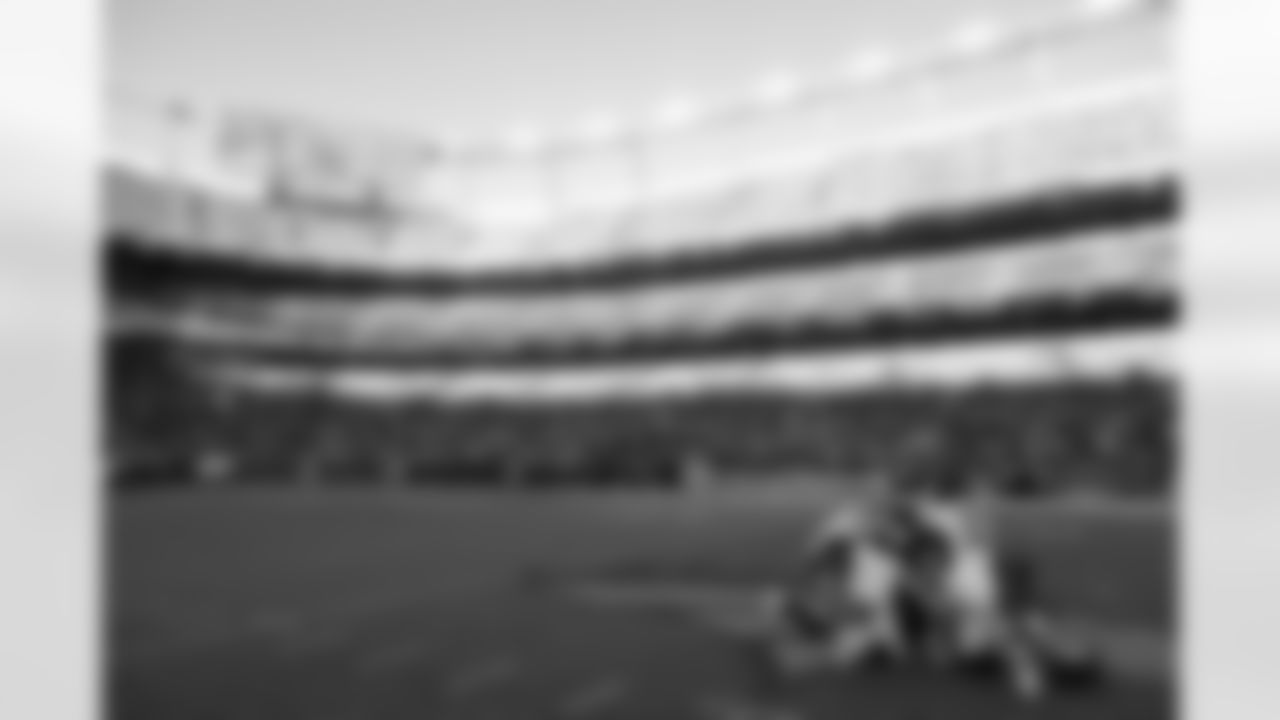 Denver Broncos quarterback Russell Wilson (3), safety Justin Simmons (31), and others pray after the Broncos' Week 2 game against the Washington Commanders at Empower Field at Mile High in Denver, Colorado on September 18, 2023. Photo by Rachel O'Driscoll / Denver Broncos