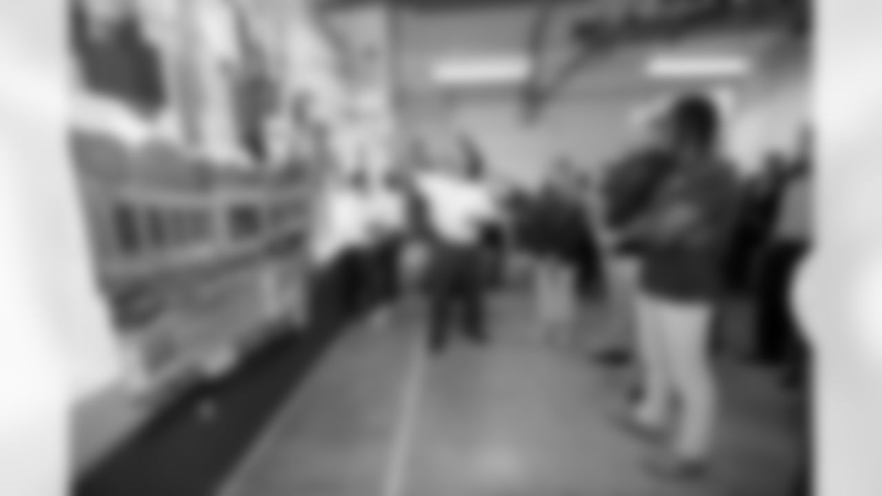 An inmate talks about his artwork during a visit to the Arkansas Valley Correctional Facility in Ordway, Colorado on October 14, 2025. In partnership with the Vera Institute of Justice, the Denver Broncos Foundation toured ChangeMakers Village (a Restoring Promise Unit).Photo by Gabriel Christus / Denver Broncos