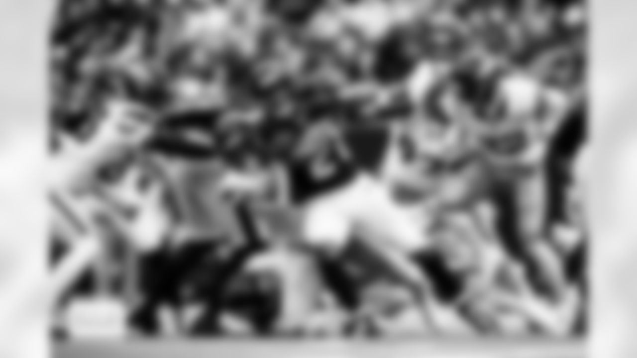 Denver Broncos safety Talanoa Hufanga (9) tackles Houston Texans running back Nick Chubb (21) during the Broncos' Week 9 game against the Houston Texans at NRG Stadium in Houston, Texas on November 2, 2025. Photo by Gabriel Christus / Denver Broncos