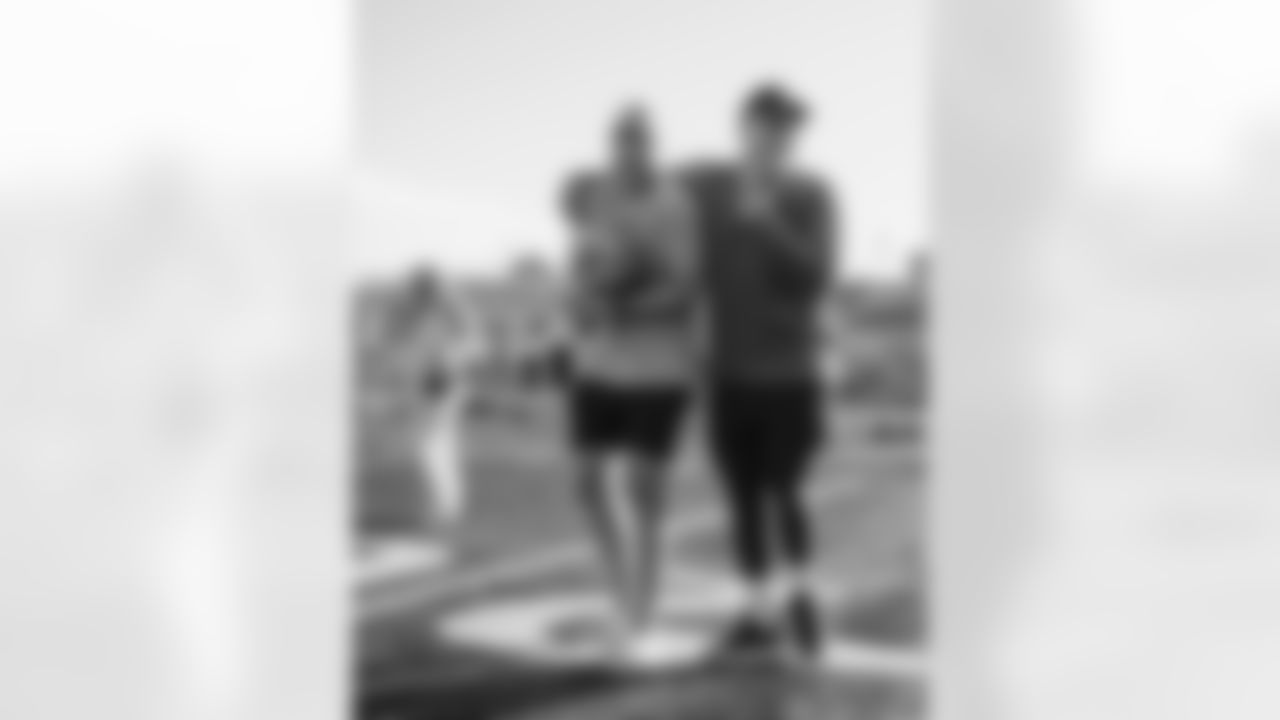 Adam Trautman and Garett Bolles during a free youth football camp hosted by Bolles and his GB3 Foundation at Legend High School on June 9, 2025 in Parker, Colorado. Photo by Eli Millner