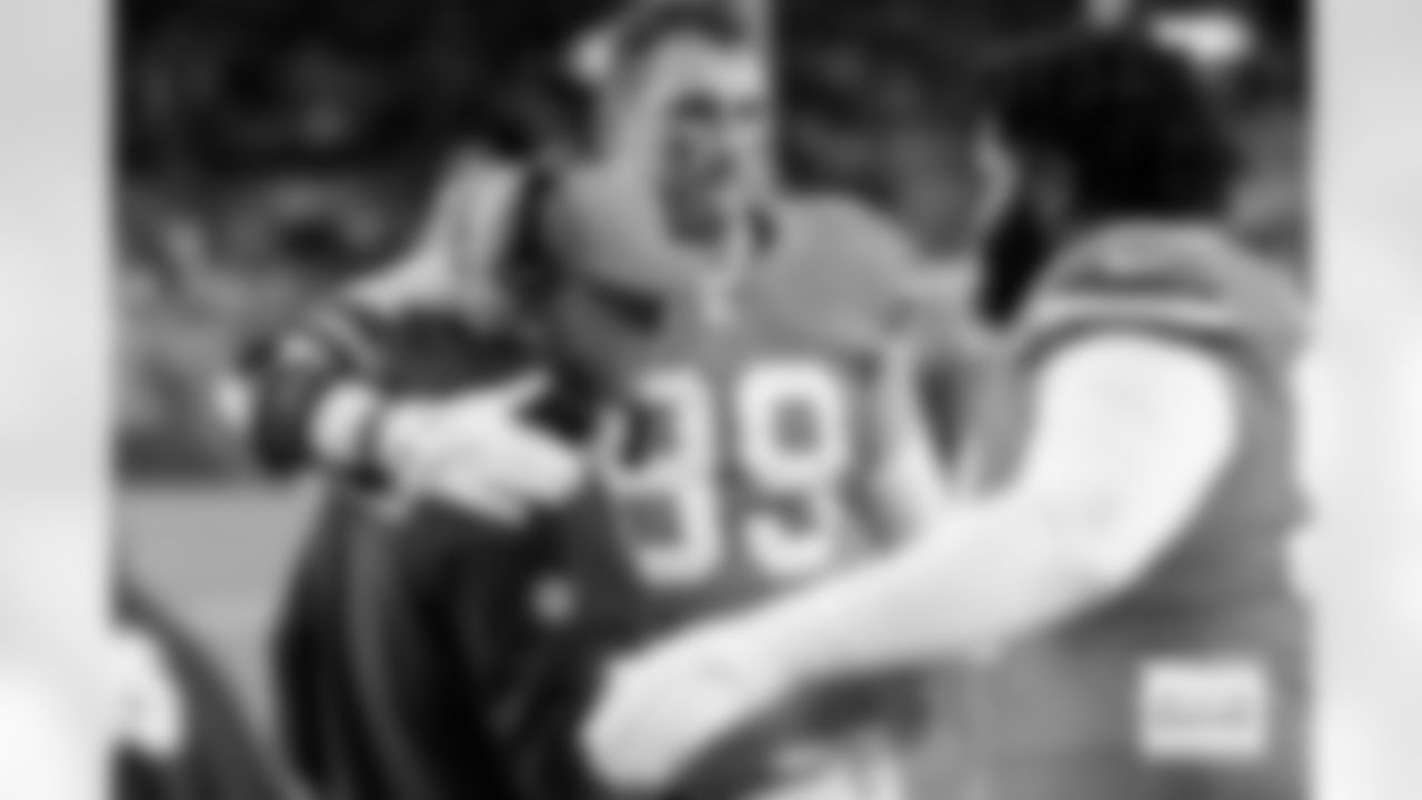 Zach Allen and D.J. Jones congratulate Sean Payton during the Broncos' Week 18 game against the Los Angeles Chargers at Empower Field at Mile High in Denver, Colorado on January 4, 2026. Photo by Gabriel Christus / Denver Broncos