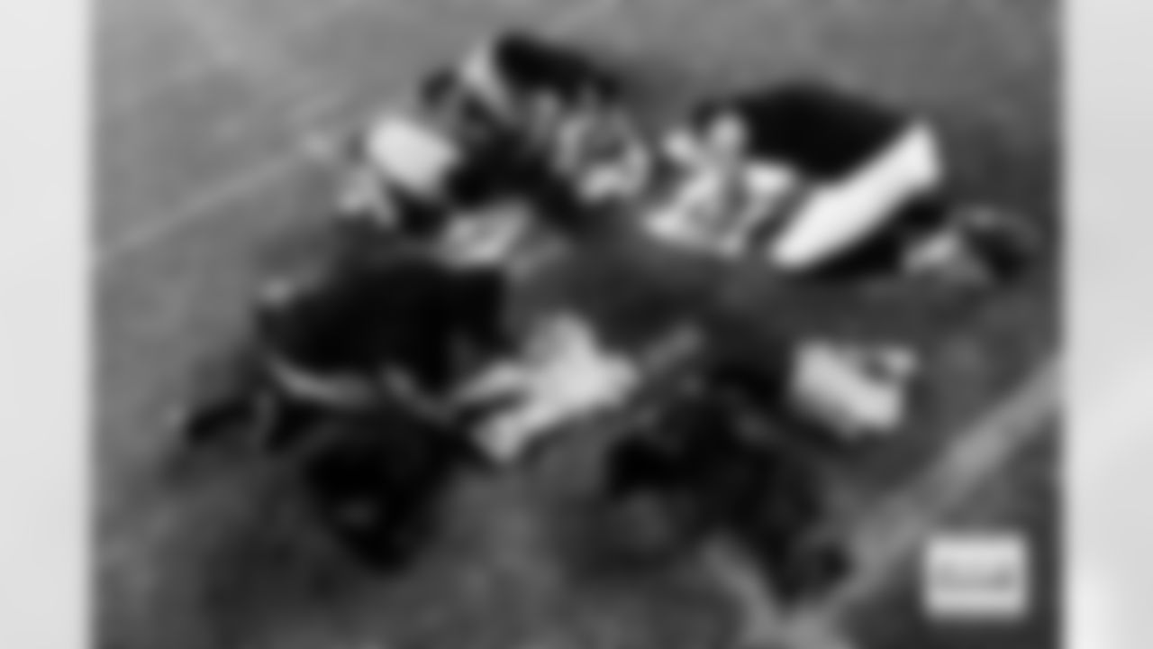 Denver Broncos safety P.J. Locke (6), wide receiver Troy Franklin (11), wide receiver Courtland Sutton (14) and Jacksonville Jaguars wide receiver Tim Patrick (17) sign jerseys as they prepare to swap after the Broncos' Week 16 game against the Jacksonville Jaguars at Empower Field at Mile High in Denver, Colorado on December 21, 2025. Photo by Ben Swanson / Denver Broncos