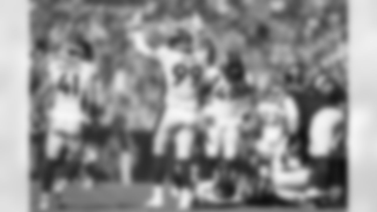 Denver Broncos defensive end Zach Allen (99) reacts after a linebacker Jonathon Cooper (0) sack during the Broncos' Week 2 game against the Washington Commanders at Empower Field at Mile High in Denver, Colorado on September 17, 2023. Photo by Gabriel Christus / Denver Broncos